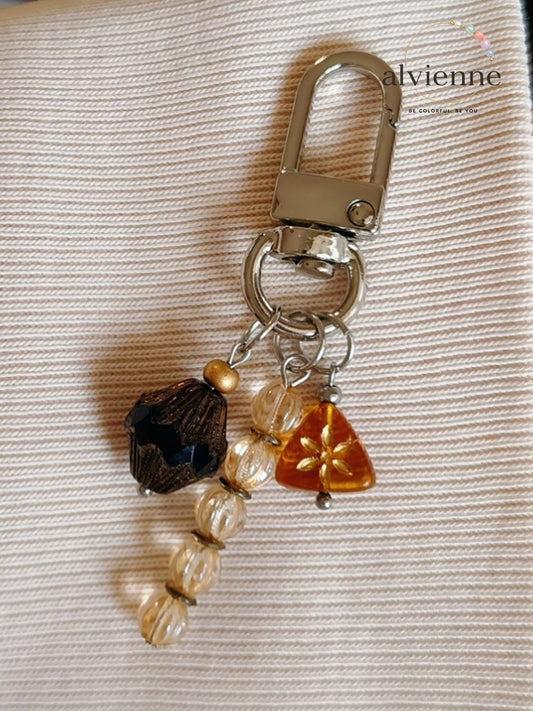 Amber Glow Glass Bead Bag Pendant